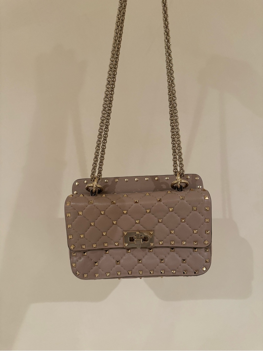 Valentino Garavani Quilted Rockstud Crossbody Bag in Taupe - Picture 1 of 6